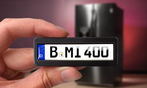 license plate magnet in hand